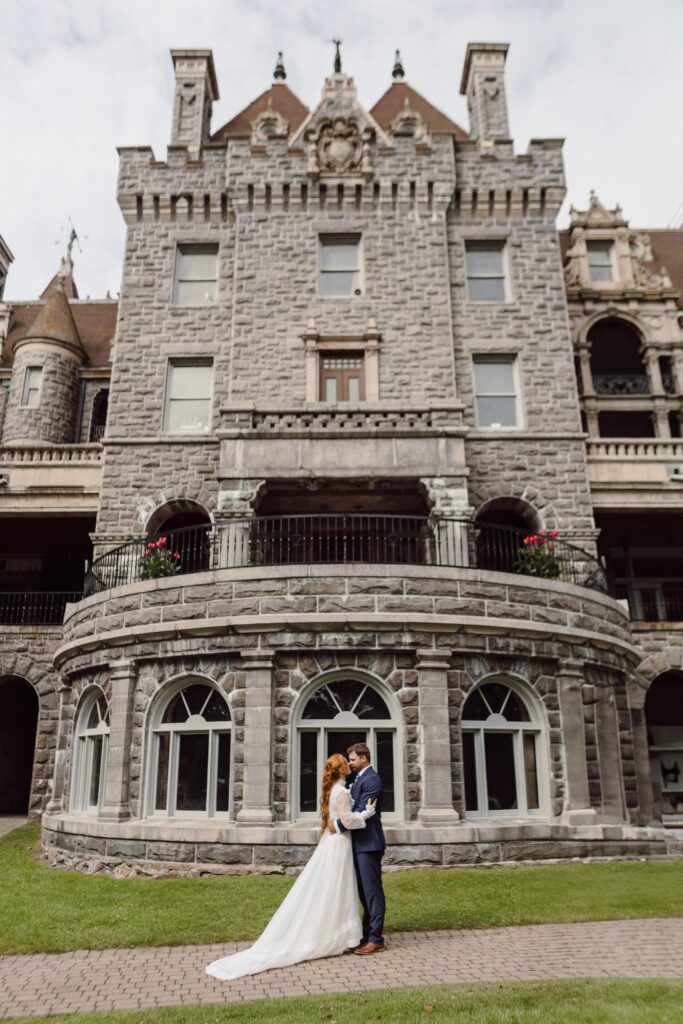bride and groom in front of Boldt Castle Elopement