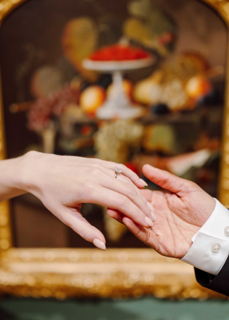 Everson art museum engagement session ring in front of painting