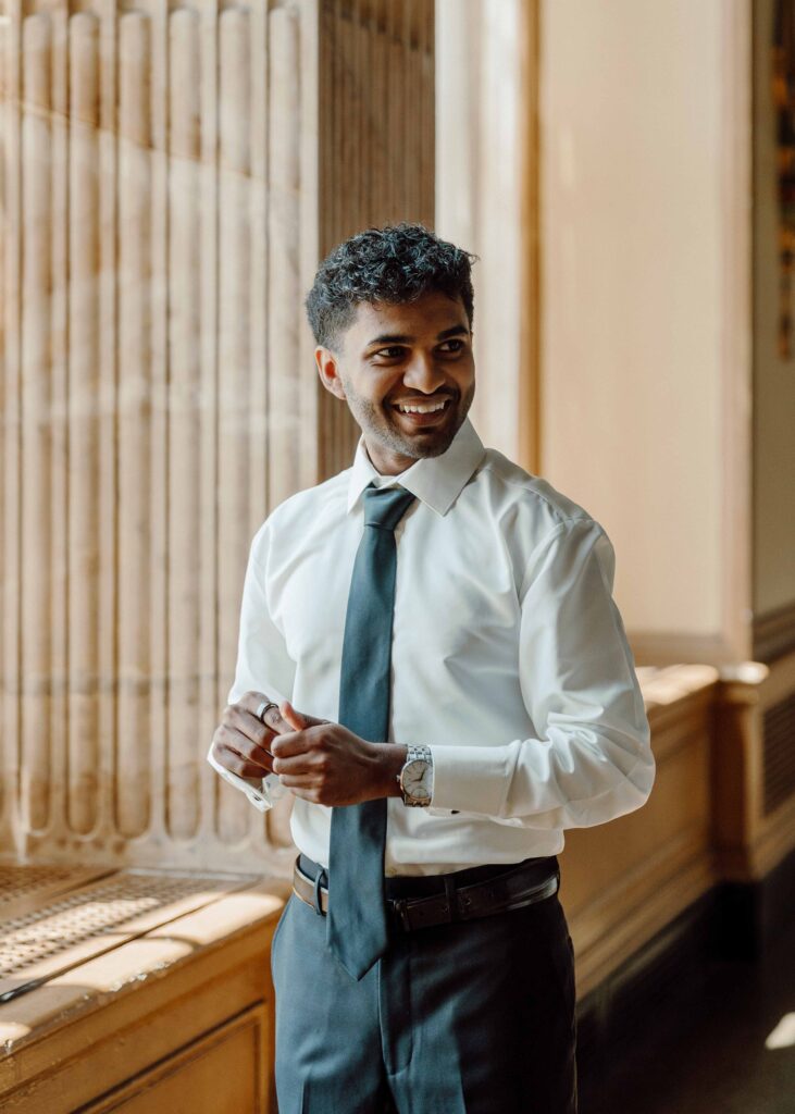 groom getting ready for wedding day at Hotel Syracuse