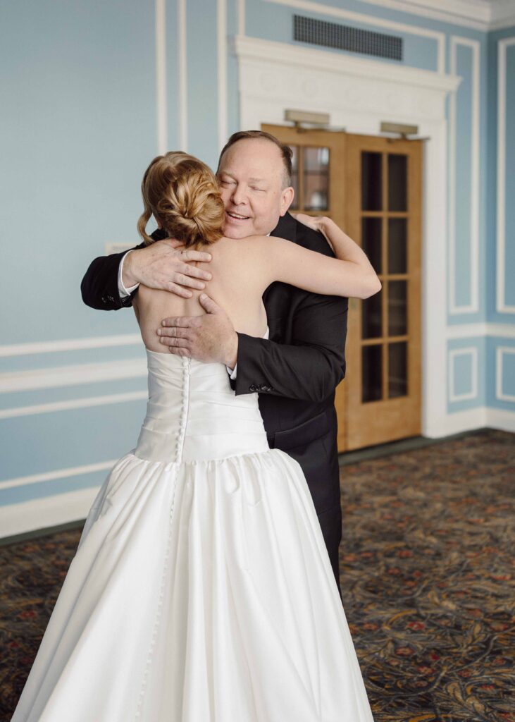 father of bride first look at Hotel Syracuse wedding