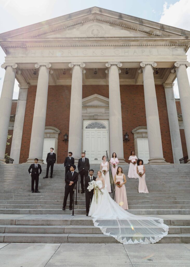 wedding party in front of Hendricks Chapel in Syracuse, NY