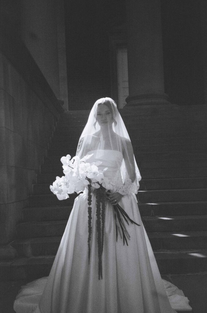 bride in gown and veil for wedding day in Syracuse, NY