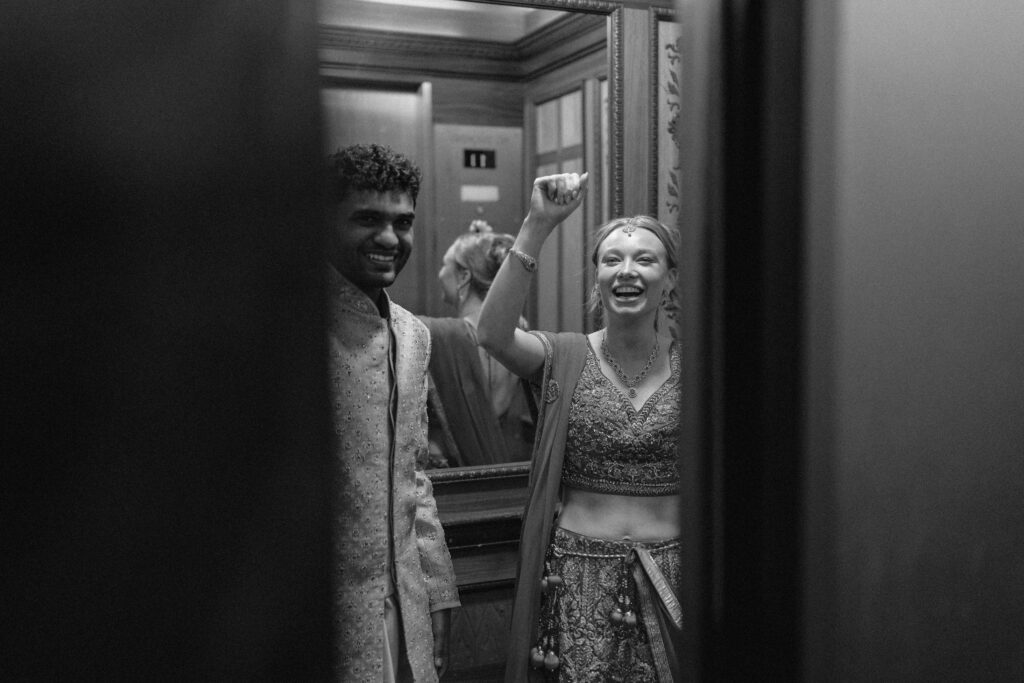 bride and groom exiting Hotel Syracuse wedding