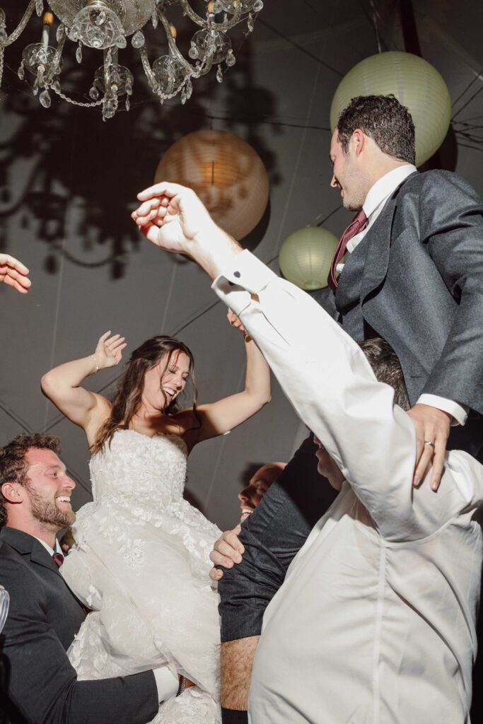 brid eand groom on dance floor at Inn at Taughannock Falls wedding