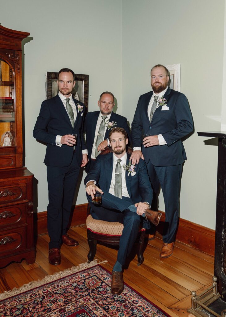 groom and groomsmen at The Munro in Skaneateles, NY