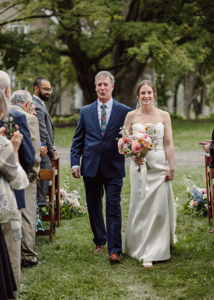 bride and father walking down the aisle