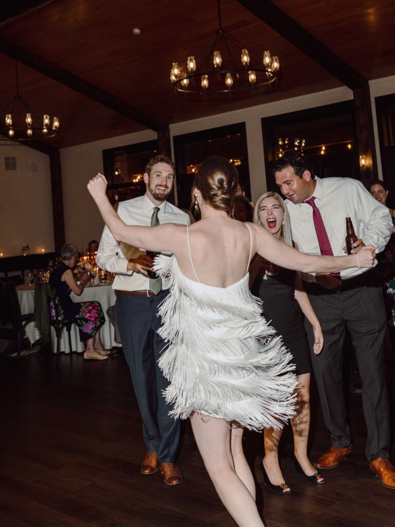 bride reception dress change at The Munro in Skaneateles, NY