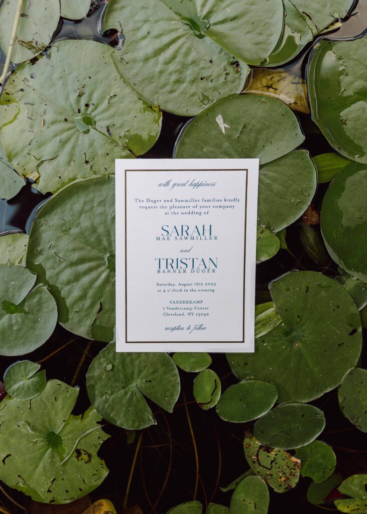 wedding invitation on lilly pad