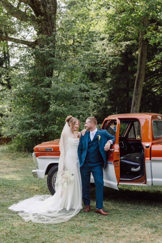 couples portrait with rustic truck