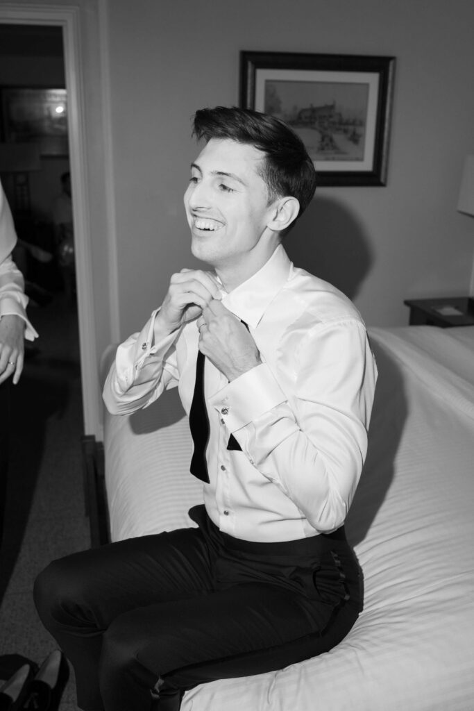 groom getting ready on syracuse, NY wedding day